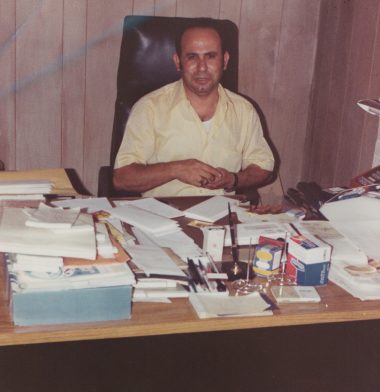 Ahmad Sitting at Desk